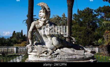 Achilleion, residence of Empress Sissi, built in 1889, architecture based on Greek mythology, garden of the Achilleion, marble statue of the reclining Stock Photo