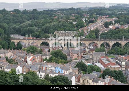 Class 66 diesel locomotive 66088 hauls an EWS coal train south over Durham railway viaduct, England, UK Stock Photo