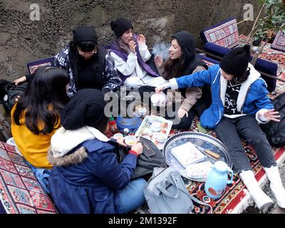 Tehran, Tehran, Iran. 9th Dec, 2022. A group of Iranian female teenagers spend their leisure time at a cafe in Darband district in northern Tehran, Iran, on December 09, 2022. (Credit Image: © Rouzbeh Fouladi via ZUMA Press Wire) Credit: ZUMA Press, Inc./17�Թ����� Live News Stock Photo