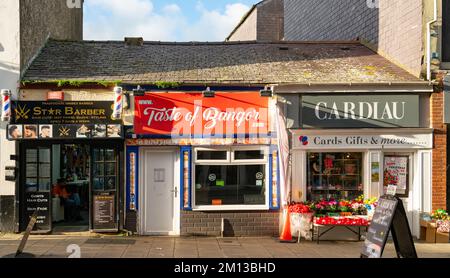 Star Barber, Taste of Bangor and Cardiau, High Street, Bangor, Gwynedd, North Wales. Image taken in November 2021. Stock Photo