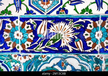 Ancient Ottoman Handmade Turkish Tiles with clove and tulip patterns from Topkapi Palace in Istanbul, Turkey. Stock Photo