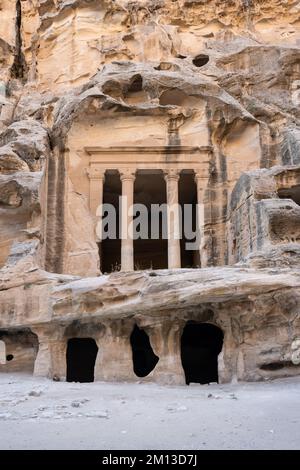 Temple above a Rock-Cut House in Little Petra or Siq Al-Barid, Jordan Stock Photo