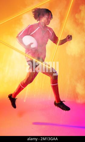 Illuminated triangle over biracial female rugby player with ball running on smoky background Stock Photo