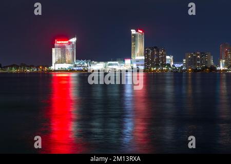 A night view of Caesar's Windsor Hotel and Casino in Windsor, Ontario, Canada, seen from Detroit across the Detroit River in Michigan, USA. Stock Photo