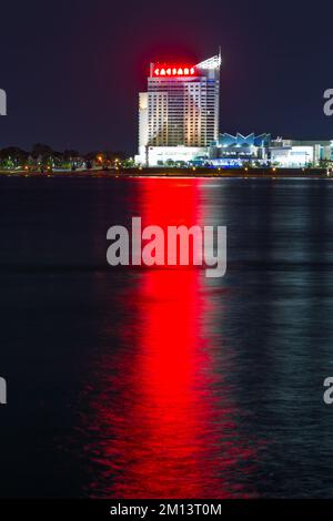 A night view of Caesar's Windsor Hotel and Casino in Windsor, Ontario, Canada, seen from Detroit across the Detroit River in Michigan, USA. Stock Photo