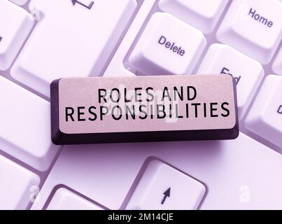 Text sign showing Roles And Responsibilities. Business overview Business functions and professional duties Stock Photo