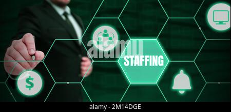 Text caption presenting Staffing. Internet Concept The percentage of workers that replaced by new employees Stock Photo