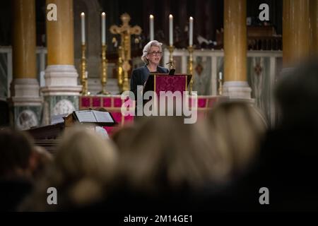 London, UK. 9th December, 2022. Sankta Lucia celebrations at Westminster Cathedral. Mikaela Kumlin Granit, the Swedish Ambassador to UK, gives a reading during the annual service organised by The Swedish Church in London. Credit: Guy Corbishley/Alamy Live News Stock Photo