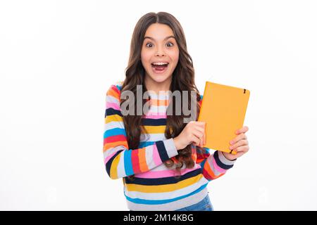 Teenage school girl with books. Schoolgirl student. Excited face, cheerful emotions of teenager girl. Stock Photo