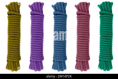 Coiled nylon rope isolated on white background. Striped nylon rope different color isolated. A coil of new colored rope. Stock Photo