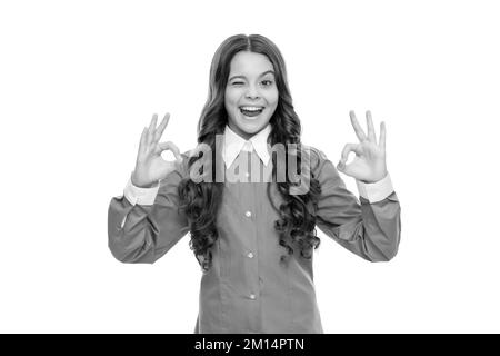 ok. winking kid with curly hair. beauty and fashion. female fashion model. Stock Photo