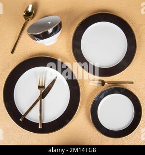 oriental designed luxury dinner plates with gold detailed Stock Photo