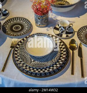 oriental designed luxury dinner plates on the table Stock Photo