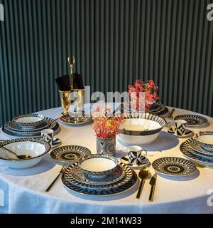 oriental designed luxury dinner plates on the table Stock Photo
