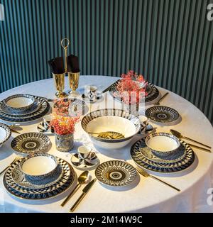 luxury plate sets in the dining room decoration Stock Photo