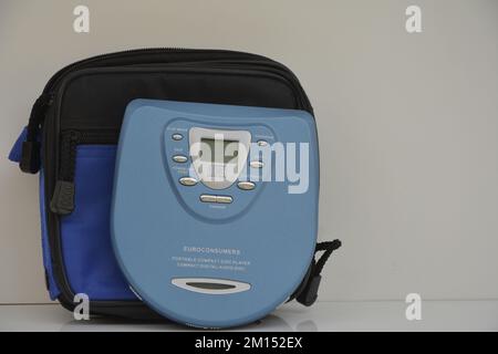 Marilia, São Paulo, Brazil - 17 October 2022: Compact digital audio disc with protective pouch. 90's Copy space. White background. : Editorial Stock Photo