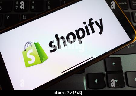 KONSKIE, POLAND - September 17, 2022: Shopify logo displayed on smartphone screen in the office. Shopify Inc. is a Canadian multinational e-commerce c Stock Photo