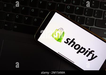 KONSKIE, POLAND - September 17, 2022: Shopify logo displayed on smartphone screen in the office. Shopify Inc. is a Canadian multinational e-commerce c Stock Photo