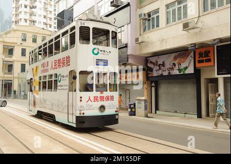 HONG KONG - OCTOBER 04: Double-decker trams on October 04, 2010. Hong Kong tram is the only system in the world run with double deckers, major tourist Stock Photo