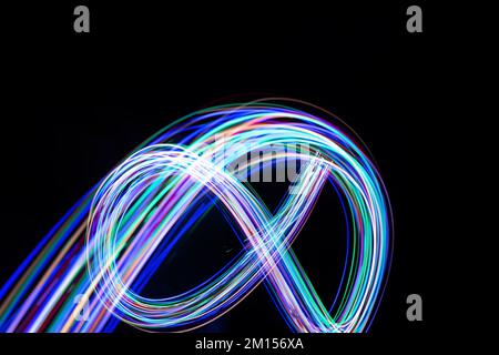Infinity sign, drawing by light, flash of light in infinity Stock Photo ...