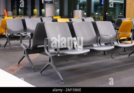 Empty waiting room. Empty benches. Lounge, waiting area at the airport. Stock Photo