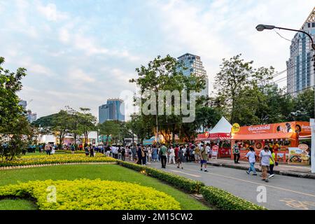 Bangkok, Thailand - Dec 8, 2022 : A large number of people took a tour of the Red Cross Fair at Lumpini Park from December 8-18, 2022 after two years Stock Photo