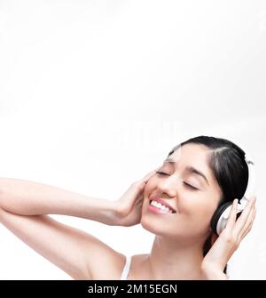 A young beautiful White Hispanic woman model sitting in a tree Stock ...