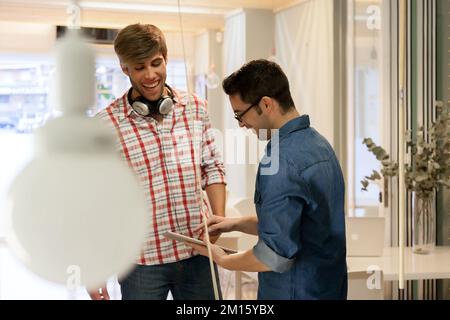 Two man working at office in casual clothes Stock Photo
