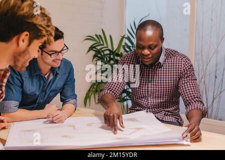 Architects and engineers working at the Creative Office Stock Photo