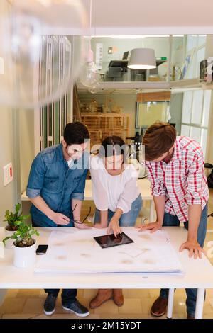 Architects and engineers working at the Office Stock Photo