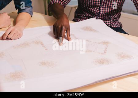 Anonymous architects team Working on a Project Stock Photo