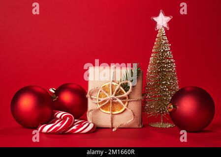 Small christmas gift wrapped in craft paper Stock Photo