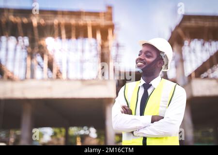 African architects engineer man work together in the inside the construction building site Stock Photo