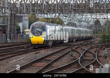 Avanti west Coast class 390 Pendolino train passing Crewe north junction, on the west coast mainline, Cheshire, UK Stock Photo