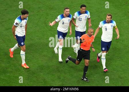 England's Harry Maguire, Jordan Henderson, Jude Bellingham and Harry Kane appeal to referee Wilton Sampaio at half-time during the FIFA World Cup Quarter-Final match at the Al Bayt Stadium in Al Khor, Qatar. Picture date: Saturday December 10, 2022. Stock Photo