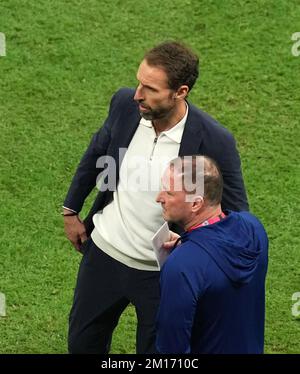 England manager Gareth Southgate and assistant manager Steve Holland dejected following the FIFA World Cup Quarter-Final match at the Al Bayt Stadium in Al Khor, Qatar. Picture date: Saturday December 10, 2022. Stock Photo