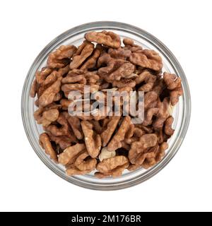 peeled walnuts in glass bowl isolated on white background, vegetarian food, organic meal, healthy snack Stock Photo