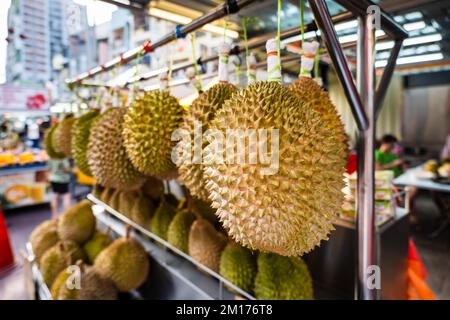 Durian fruit in fruit market in Asia. The durian is the edible fruit of several tree species belonging to the genus Durio Stock Photo