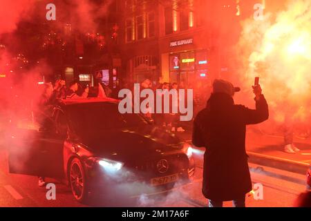 12-10-2022.Rotterdam,The Netherlands.Big celebration in the streets after Morocco beat Portugal 1-0 at the world cup.Roads were blocked with honking cars and there was a lot of heavy fireworks.The police cleared the area after a few hours. Stock Photo