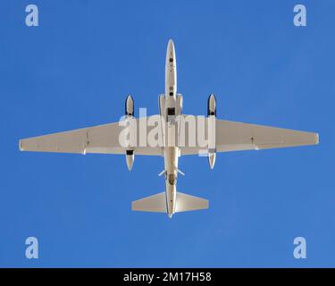 High-altitude ER2 aircraft flying over California's Mojave Desert. Digitally enhanced. Elements of this image furnished by NASA. Stock Photo