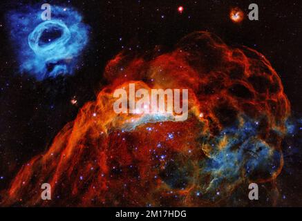 Large Magellanic Cloud in the Milky way showing a giant red nebula and a smaller blue nebula. Digitally enhanced. Elements of image furnished by NASA Stock Photo