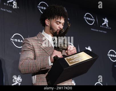 New York, United States. 10th Dec, 2022. USC Trojans quarterback Caleb Williams holds the Heisman Trophy at the Marriott Marquis after he wins the award in New York City on Saturday, December 10, 2022. Photo by John Angelillo/UPI Credit: UPI/Alamy Live News Stock Photo