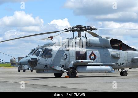 Tokyo, Japan - May 22, 2022: United States Navy Sikorsky MH-60R Seahawk utility maritime helicopter from HSM-51 Warlords. Stock Photo