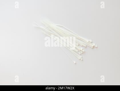 Plastic cable ties isolated on a white background Stock Photo