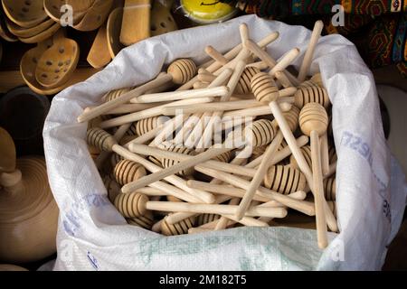 Set of honey dippers made of wood Stock Photo