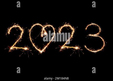 2023 written with Sparkle firework on black background, happy new year 2023 concept. Stock Photo
