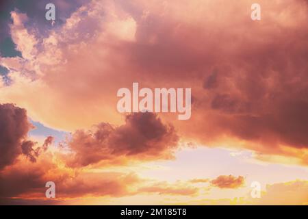Amazing natural bright dramatic sky in different colours during sunset sunrise time. Colorful sky background. Beauty in nature. Sunset sky natural Stock Photo