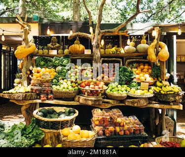 Local outdoor market. Fruits and vegetables in baskets and boxes. Stock Photo