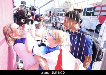 England's Jude Bellingham takes photos with fans outside the Souq Al-Wakra hotel, Qatar, following England's loss to France in their World Cup quarter-final in Al Khor on Saturday.Picture date: Sunday December 11, 2022. Stock Photo