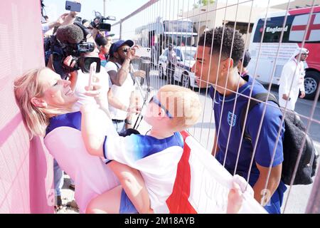 England's Jude Bellingham takes photos with fans outside the Souq Al-Wakra hotel, Qatar, following England's loss to France in their World Cup quarter-final in Al Khor on Saturday.Picture date: Sunday December 11, 2022. Stock Photo